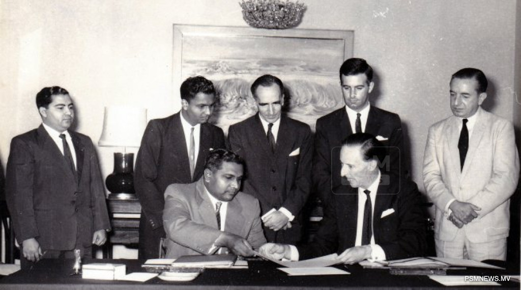 1965 picture Prime Minister Ibrahim Nasir signing the declaration of Independence